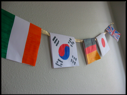 student-made bulletin board bunting of different countries flag
