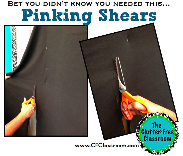teacher using pinking sheers to cut bulletin board fabric