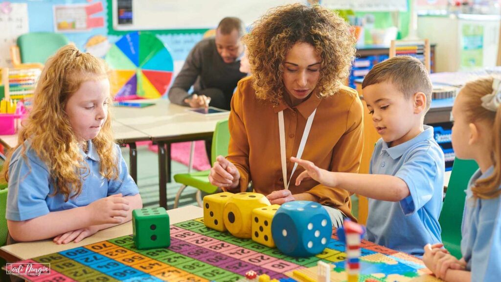 teacher in a small group for guided math