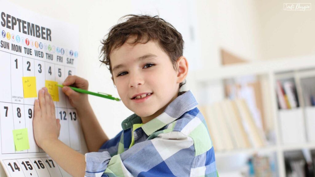 student using classroom calendar