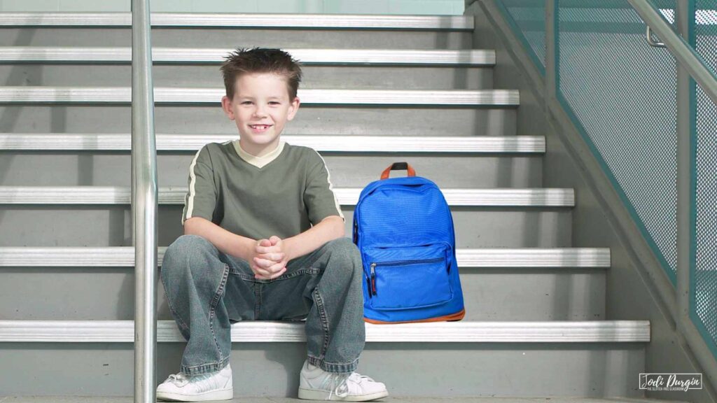 elementary student on stairs