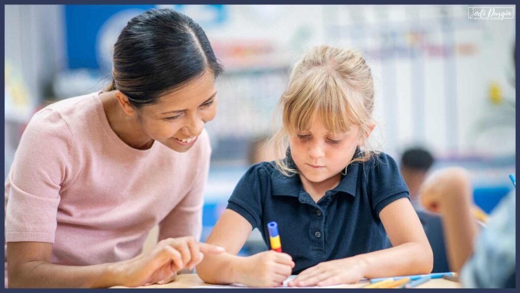 parent volunteer in an elementary math classroom, which s a great example of parent participation