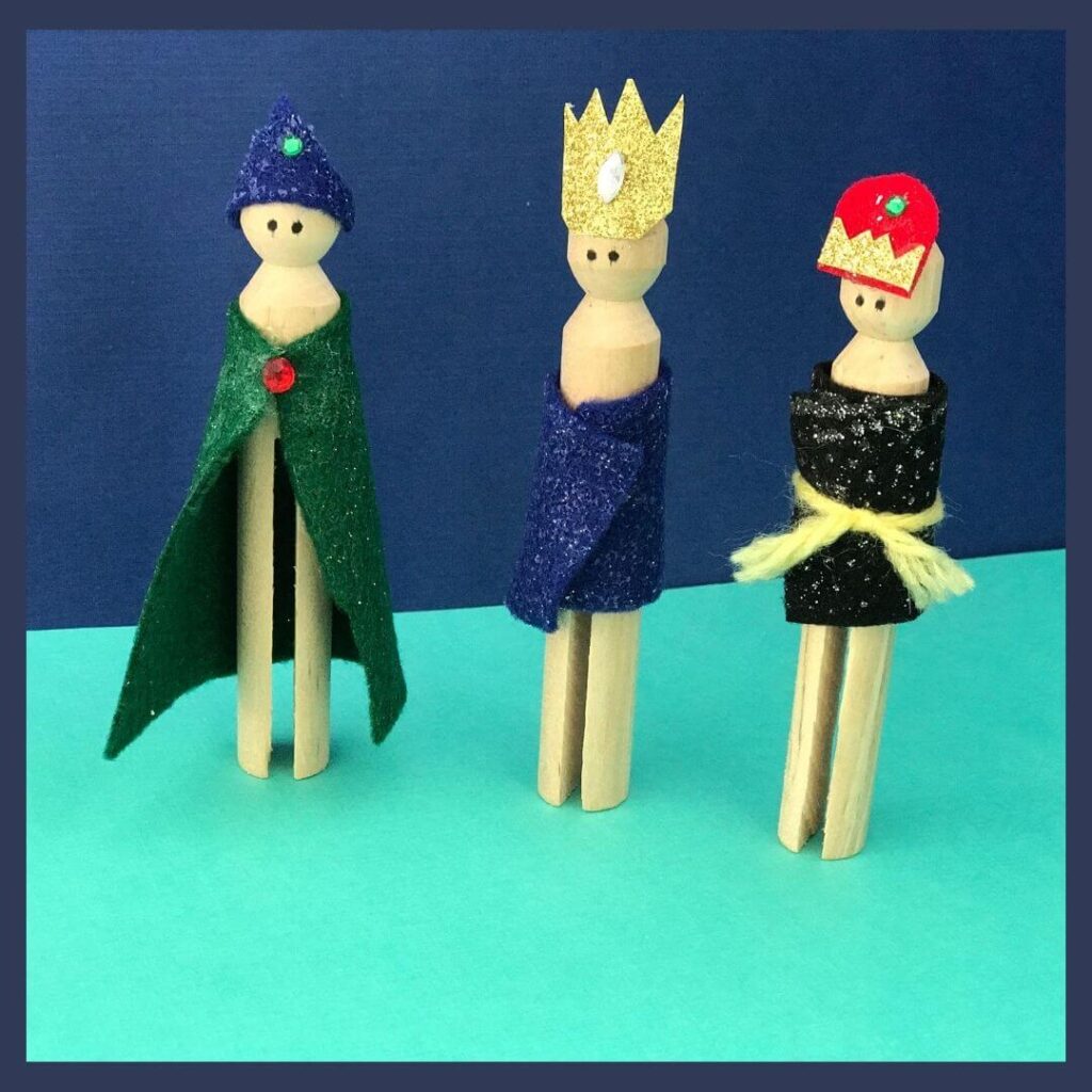 A Spain Christmas craft that is three wooden clothes pins decorated to look like kings