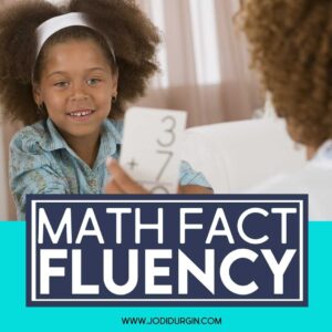 girl practicing math facts with flash cards with her mom