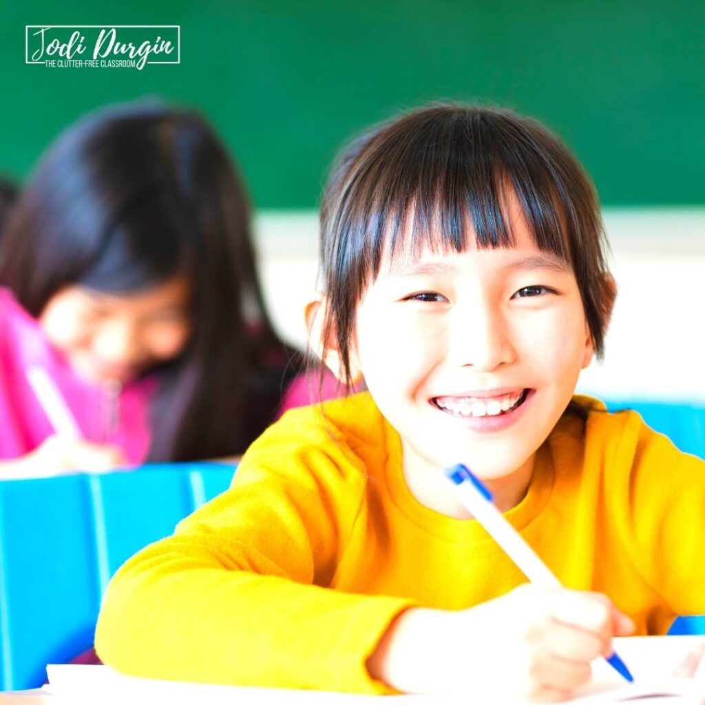 3rd grade student using strategies for writing a paragraph in the classroom