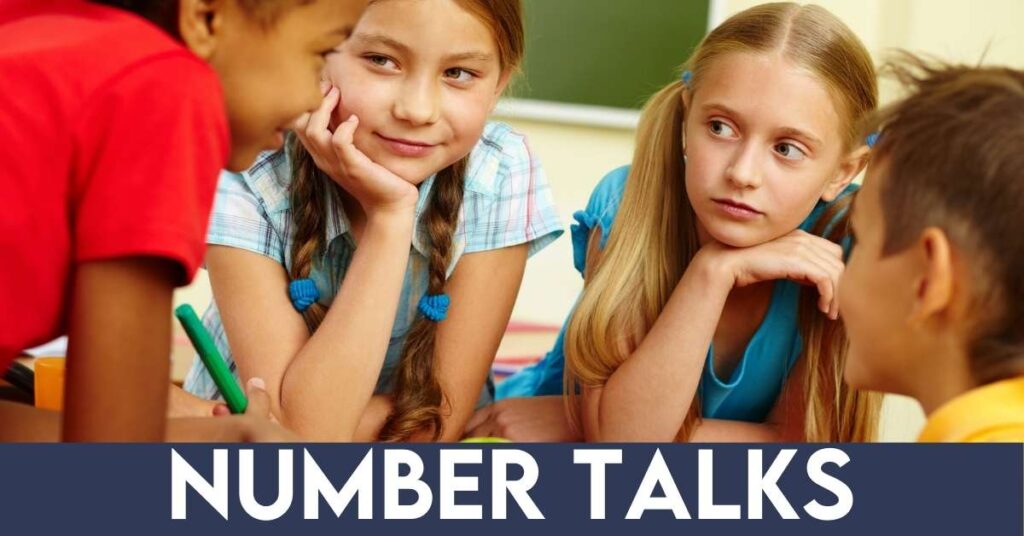 Four kids in class collaborating on math number talks