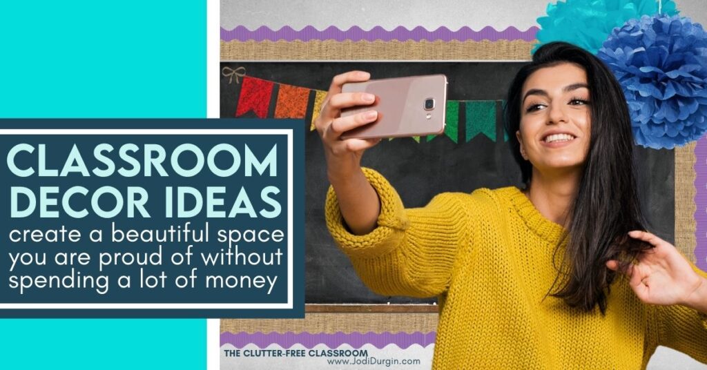 female teacher taking a selfie with her classroom bulletin board display