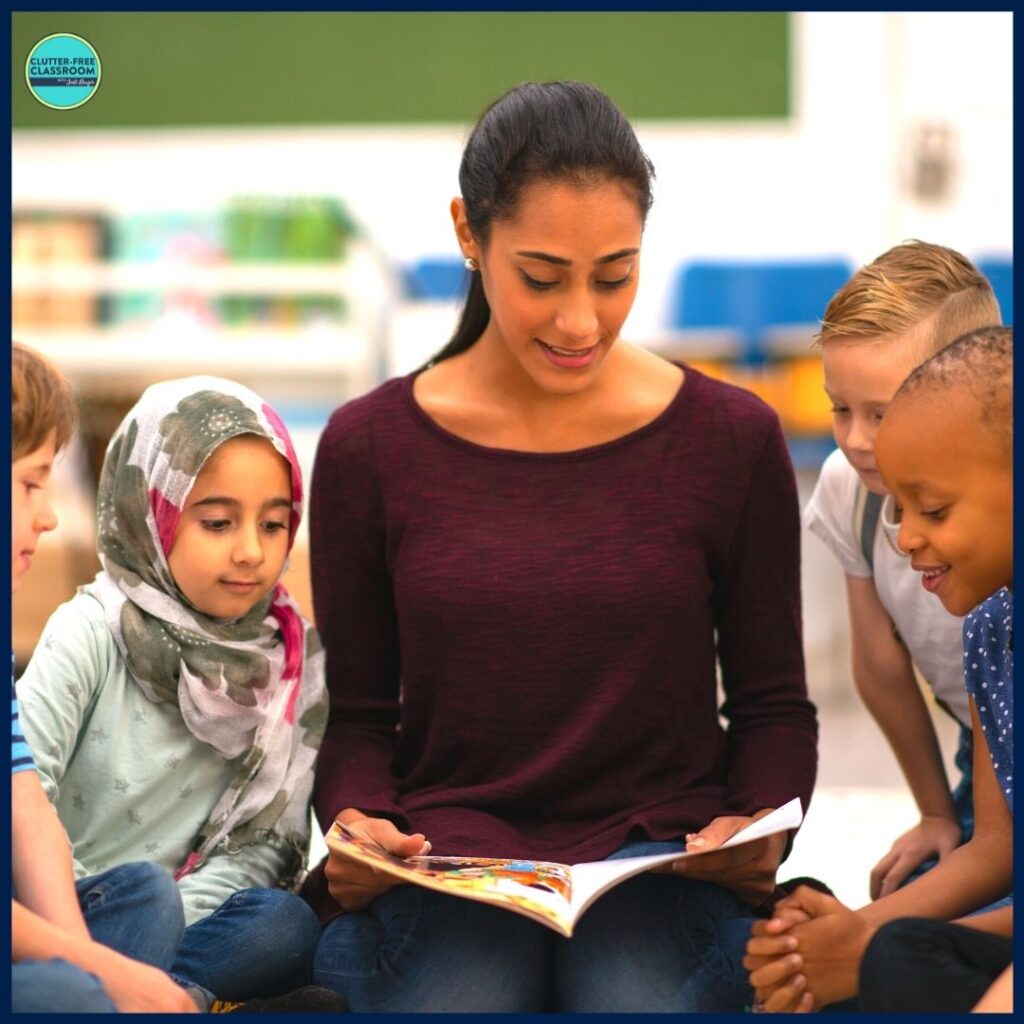 elementary teacher reading aloud a picture book to her students