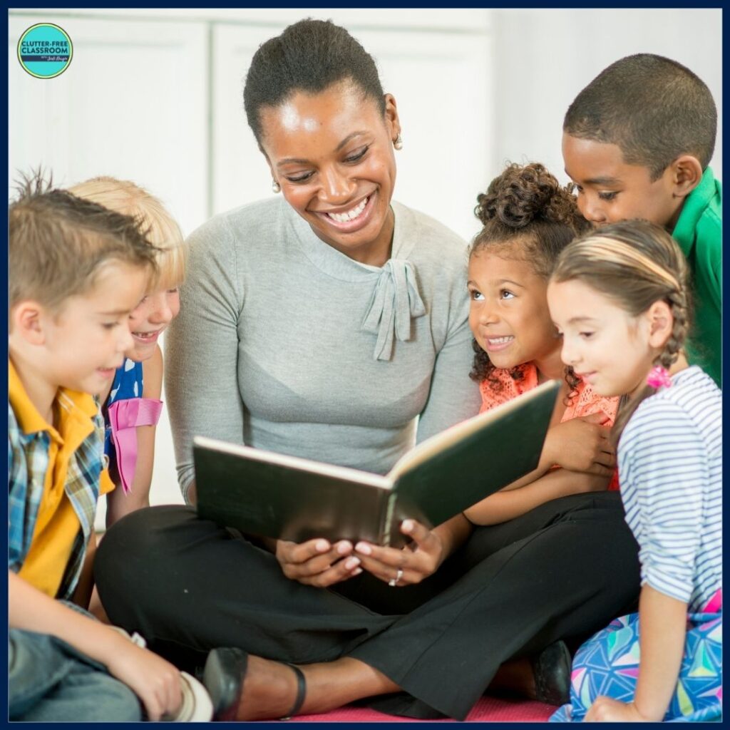 elementary teacher reading aloud a picture book to her students