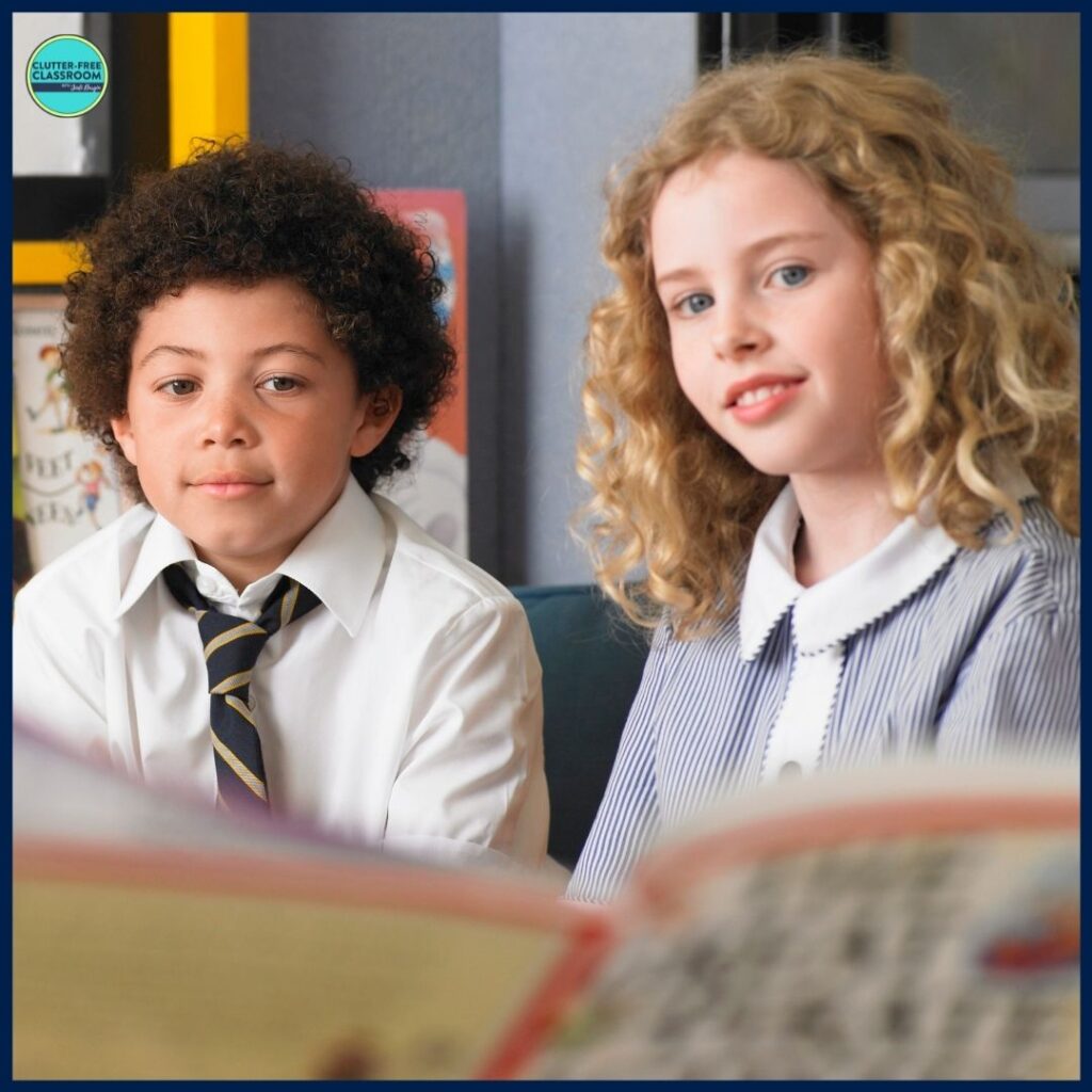 two elementary students listening to an interactive read aloud