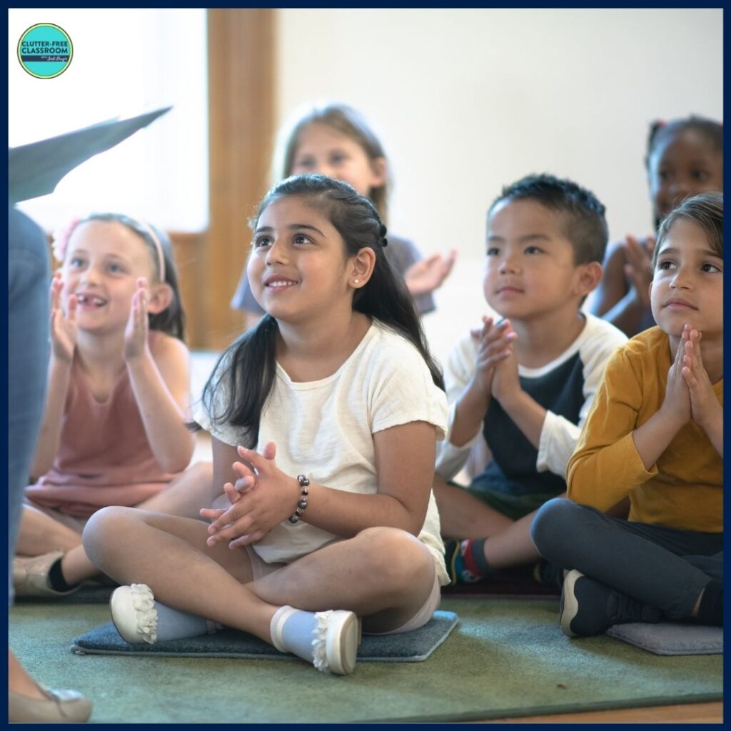 students listening to a picture book being read aloud by their teacher