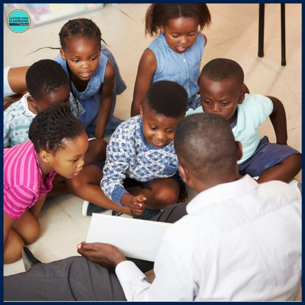 elementary teacher reading aloud a picture book to his students