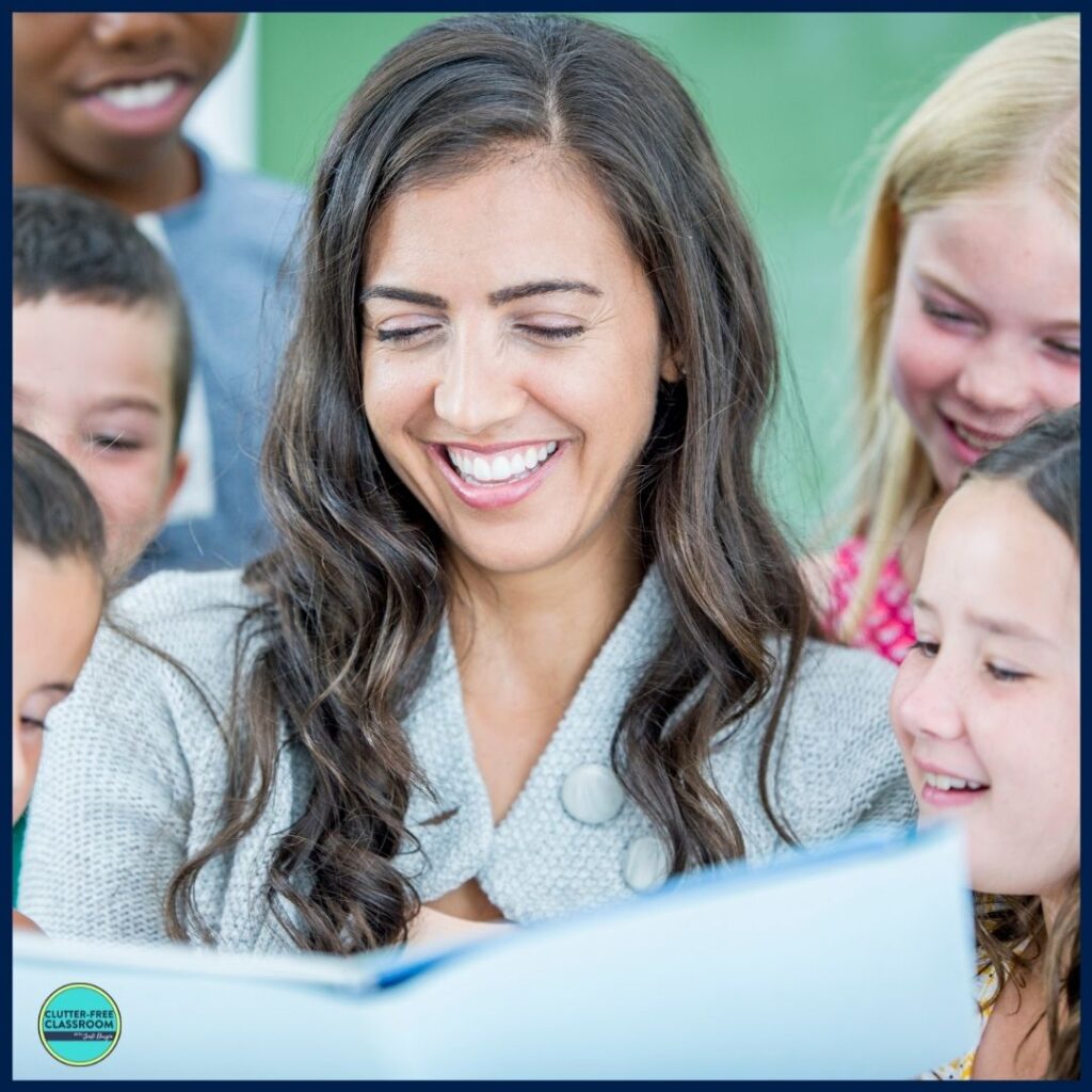 elementary teacher reading aloud a picture book to her students