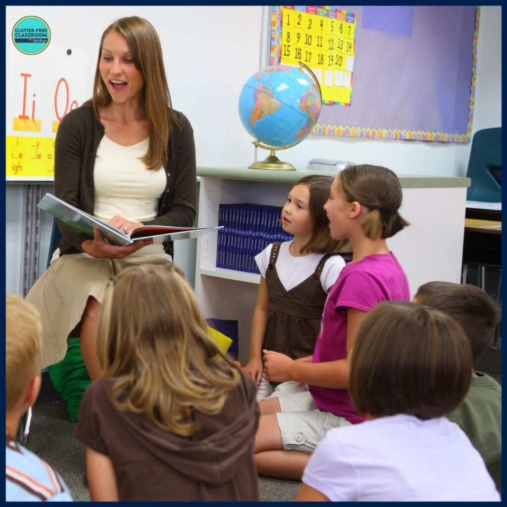 elementary teacher reading aloud a picture book to her students