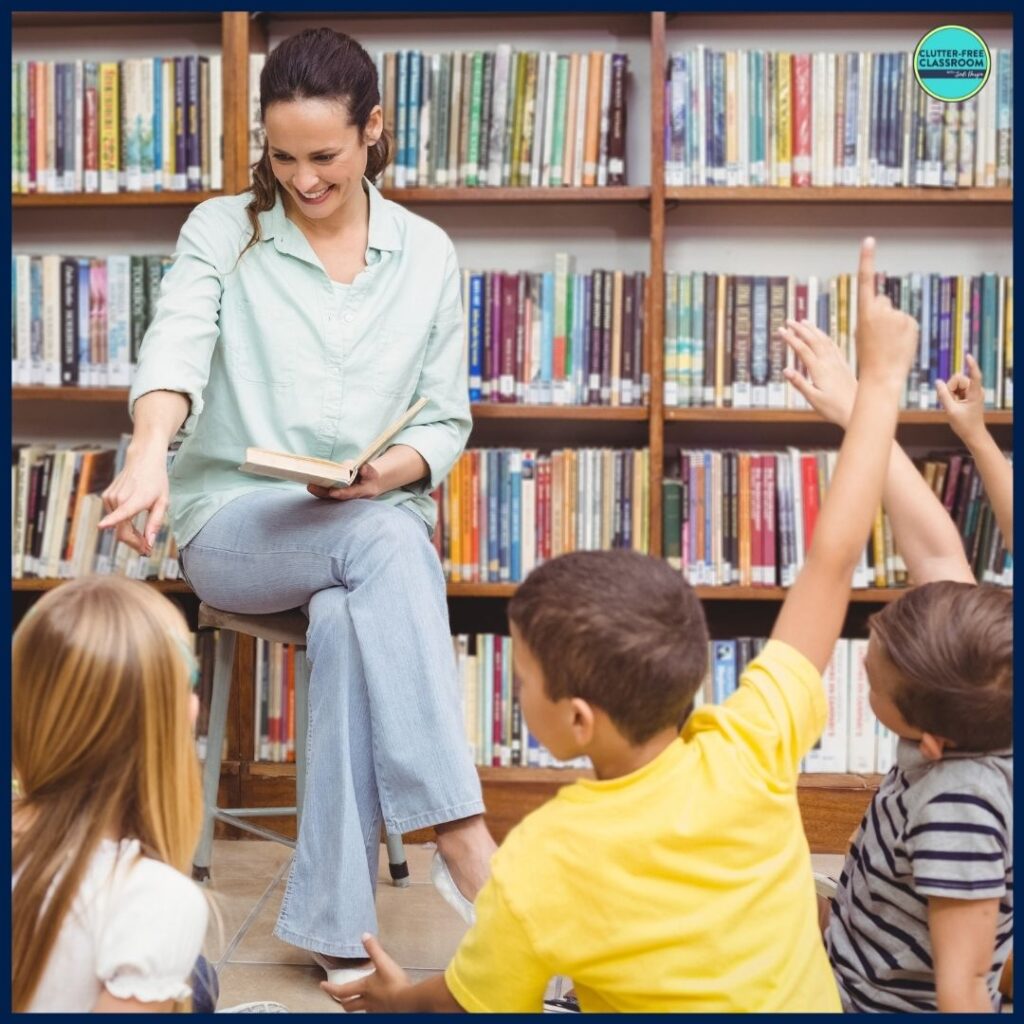 elementary teacher calling on her student to answer a question